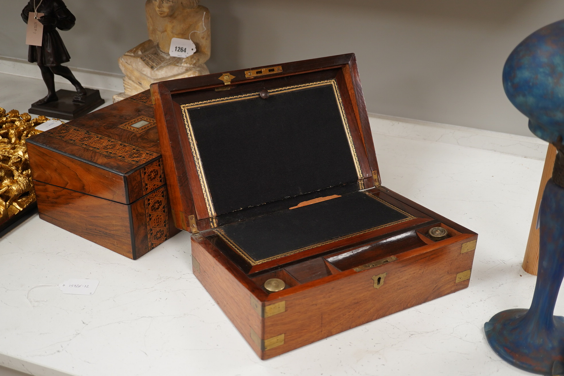 A mahogany brass mounted 19th century writing box and a walnut inlaid and mother of pearl writing box, brass mounted box, 35cm wide. Condition - exterior good, felt on slope torn.